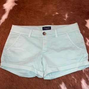 American eagle teal stretch shirts. Size 8.